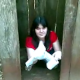 A Spanish-speaking video featuring a girl who just finished shitting in an outhouse and is wiping her ass.